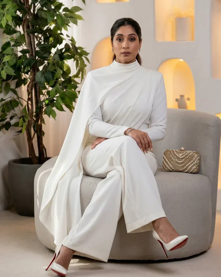 Bandita Patro in a draped ivory ensemble